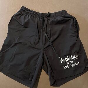 Black Gym Fabletics with zipper closure pockets